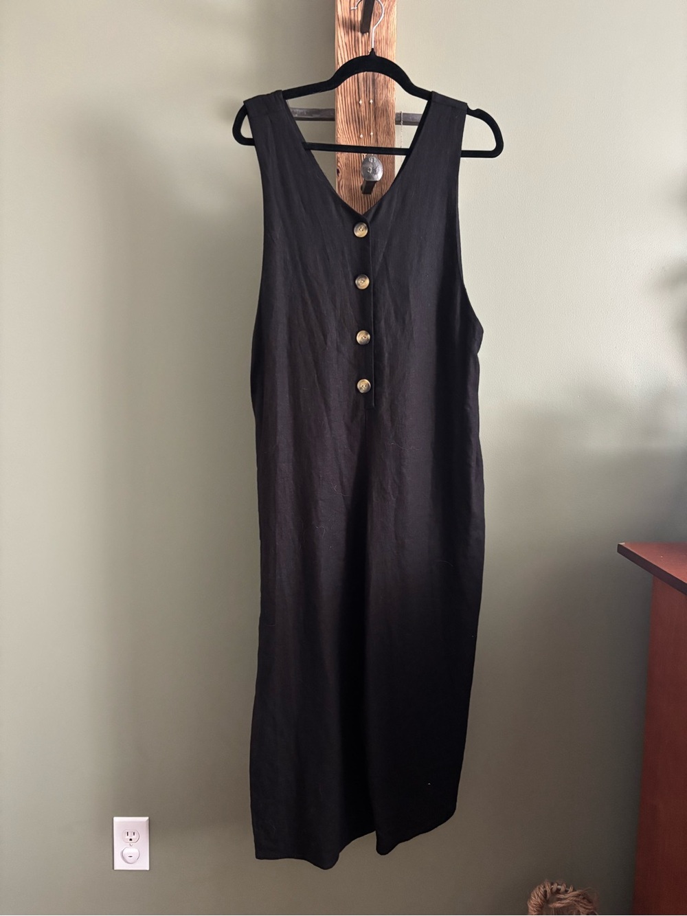 65.) Monteau / Black Sleeveless V-Neck Jumpsuit with Button Details